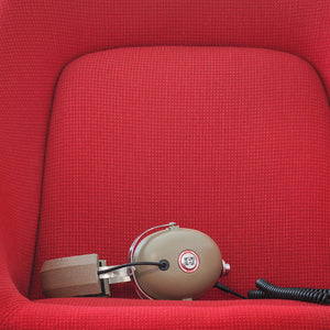 Koss Pro4aa on red vintage tweed chair 