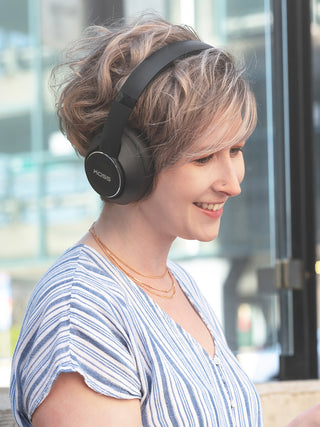 Woman wearing Koss BT740i QZ Wireless Noise Cancelling Headphones