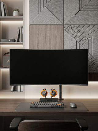 A pair of koss KSC75 earclips on a modern desk