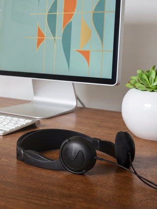 Koss KTXPro1 Headphone laying on a modern desk