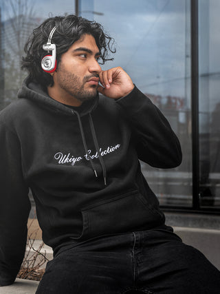 Person wearing a black hoodie wearing white porta pro wireless