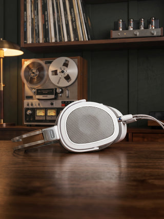 Koss A550 laying on a desk with audio equipment