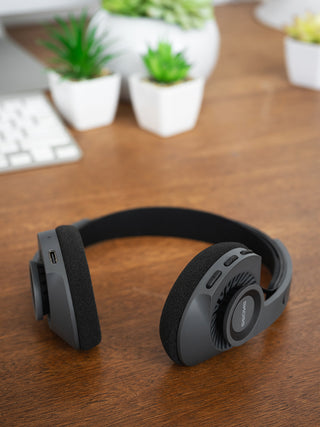 Koss KPH30i Wireless Headphones in Gray showing it's USB-C charging port and integrated audio controls