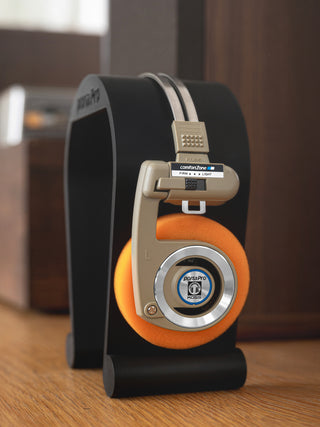 Beige Rythm wireless Porta Pro's resting on new 3D printed Koss Porta Pro stand.